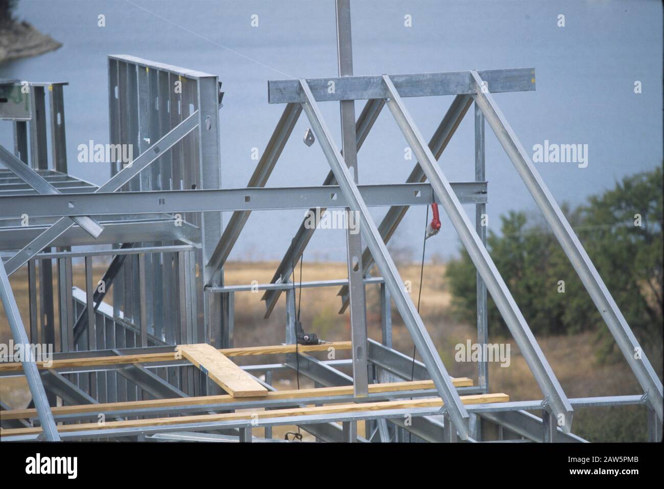 Home under construction using steel frame instead of wood for added strength. Stock Photo