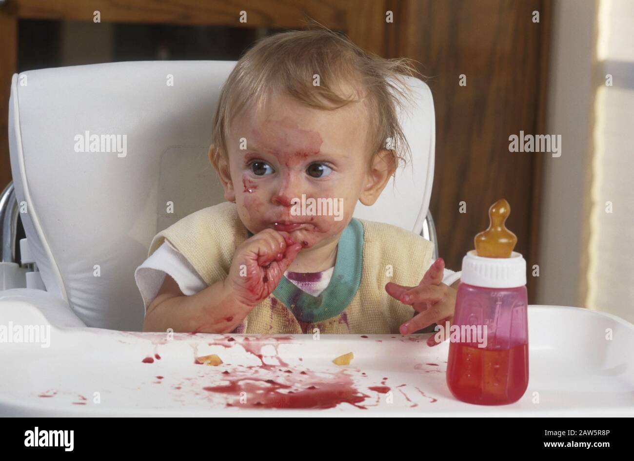 Baby high chair finger food fruit hires stock photography and images