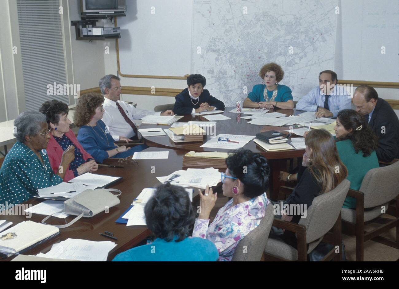 Members of the 1990 United States census Complete Count Committee meet in San Antonio, Texas, to discuss raising awareness among and motivate residents to participate in the upcoming count. Stock Photo