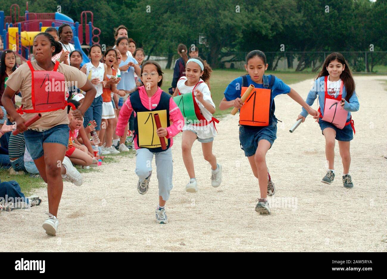 Third grade students participate in halfmile relay race where each