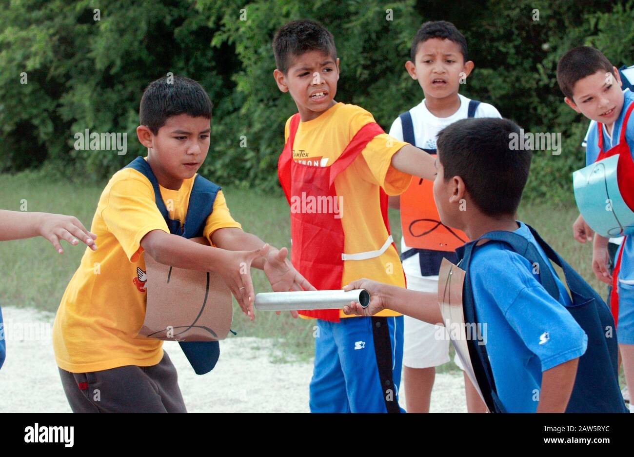 Third grade students participate in halfmile relay race where each