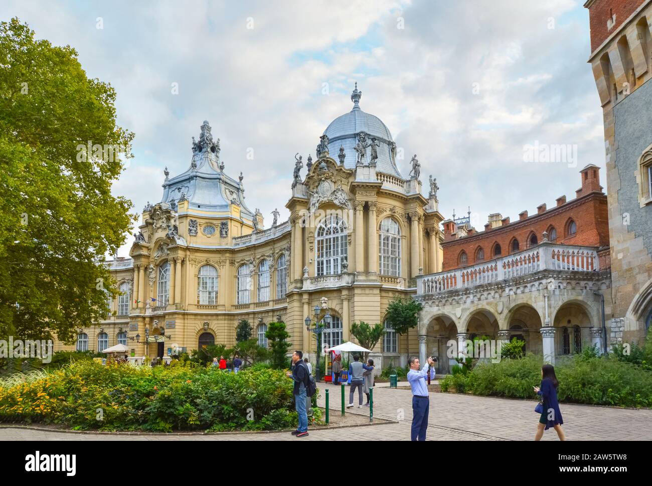 Tourists visit the interior of Vajdahunyad Castle in the City Park of Budapest, Hungary, built in 1896 as part of the Millennial Exhibition. Stock Photo