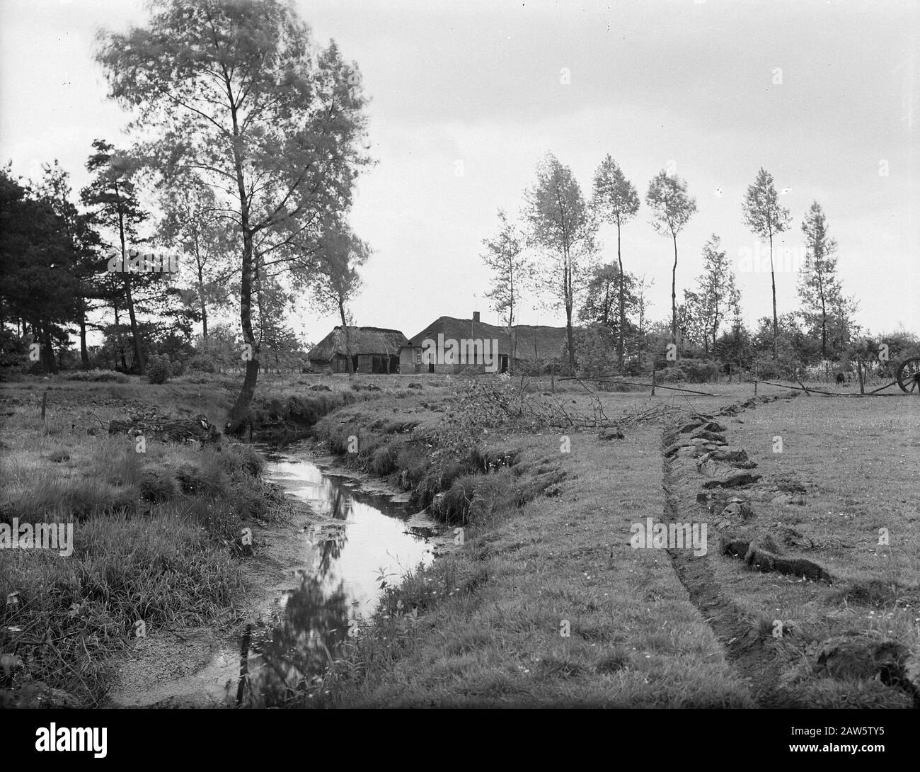 normalization of streams, digging and filling in trenches, laying drains, culverts and hedge, streams, old Rosep new laap Date: undated Keywords: streams, culverts and hedge, digging and filling in trenches, laying drains, normalization of streams Person Name: new laap old Rosep Stock Photo