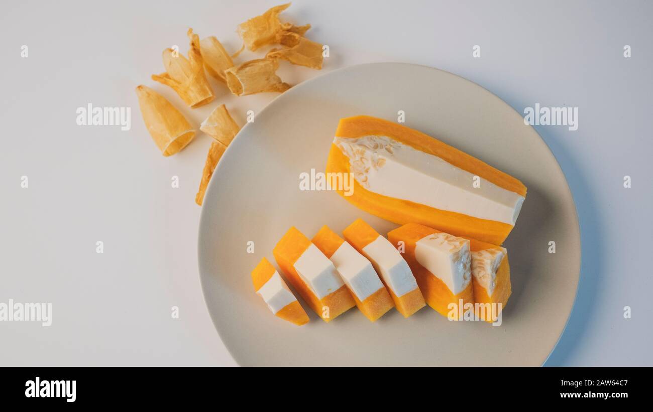 Delicious papaya milk jelly, sliced on a plate. Home made dessert. The
