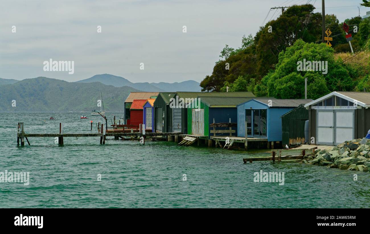 Colourful boat sheds at Waikawa Bay, Marlborough Sounds, New Zealand. Stock Photo