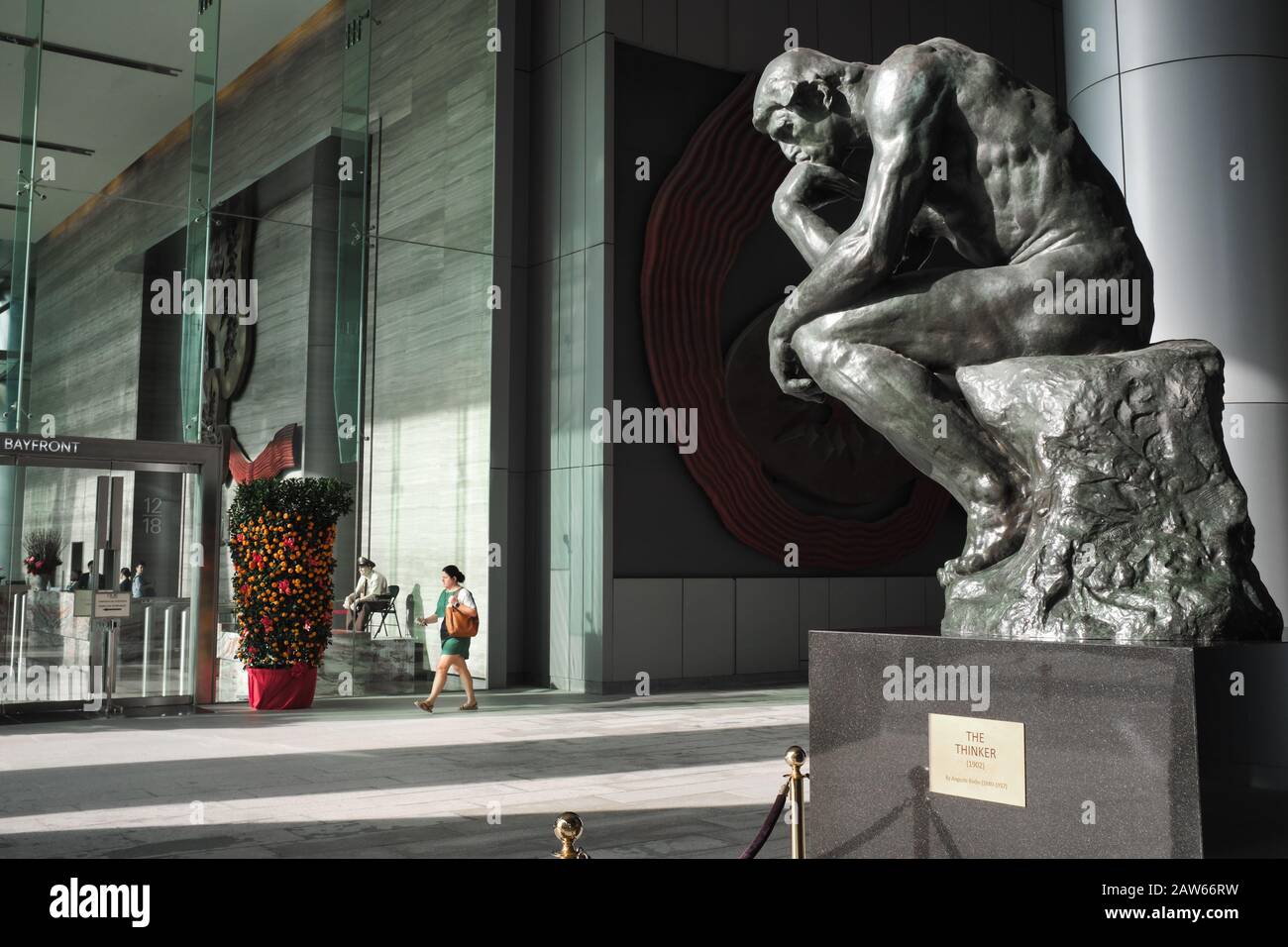 A replica of sculpture 'The Thinker' by August Rodin at OUE Tower, Marina Bay, Singapore Stock Photo