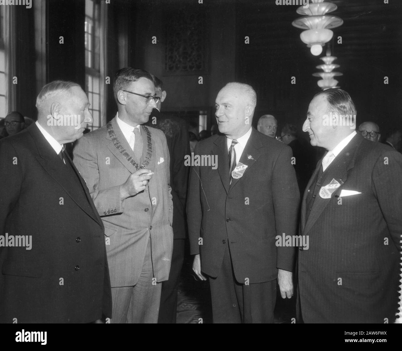 Welcome by Mayor Van Hall of members of the National Federal Council of the former opposition in the Netherlands Date: June 6, 1958 Keywords: Revenue, mayors, members Stock Photo
