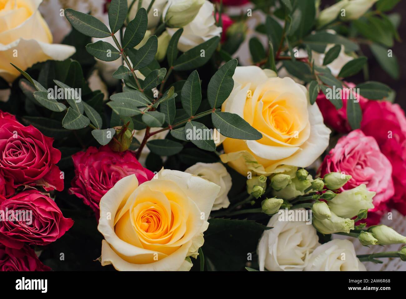 Beautiful bouquet of roses different colors and sizes Stock Photo - Alamy