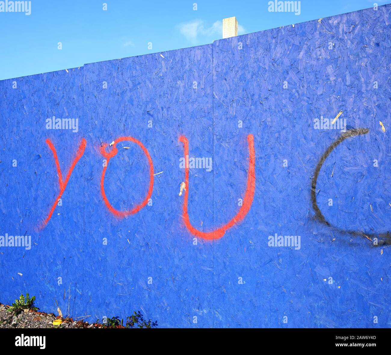 February 2020 - The word YOU on a blue hoarding in Portishead Stock Photo