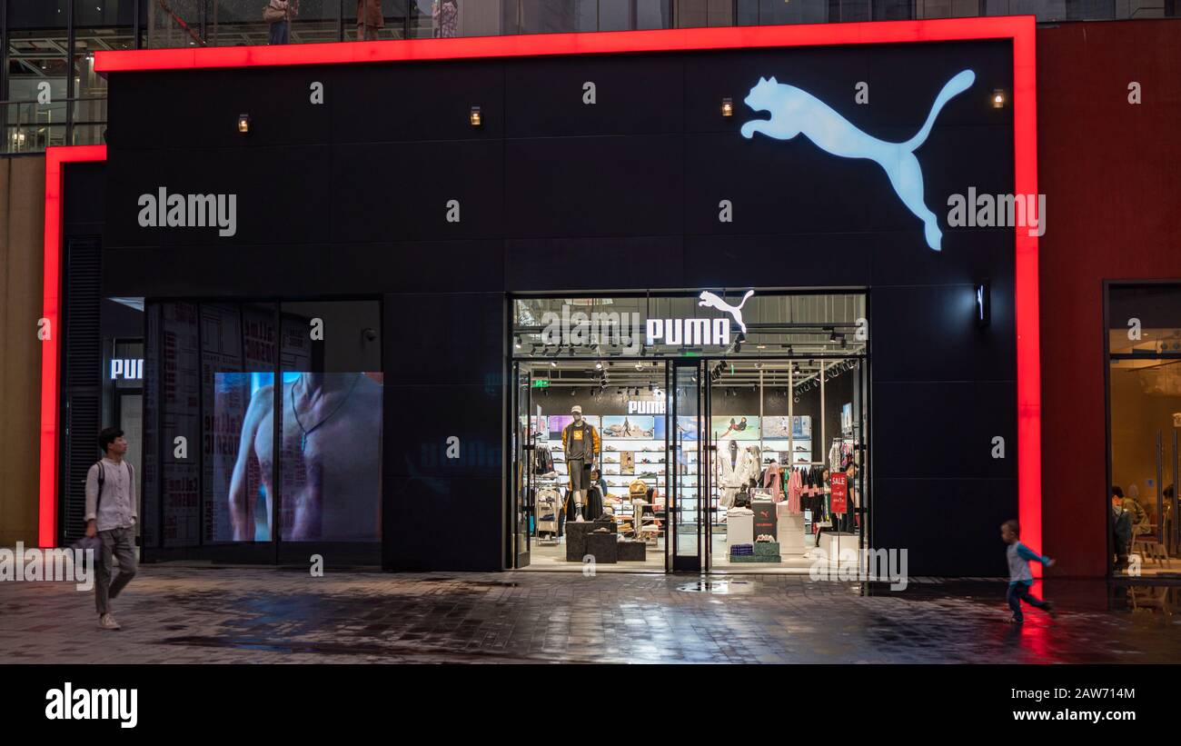 Shenzhen, China, April, 2019. Puma store at night, branded as Puma, is a  German multinational company that designs and manufactures athletic and  casua Stock Photo - Alamy