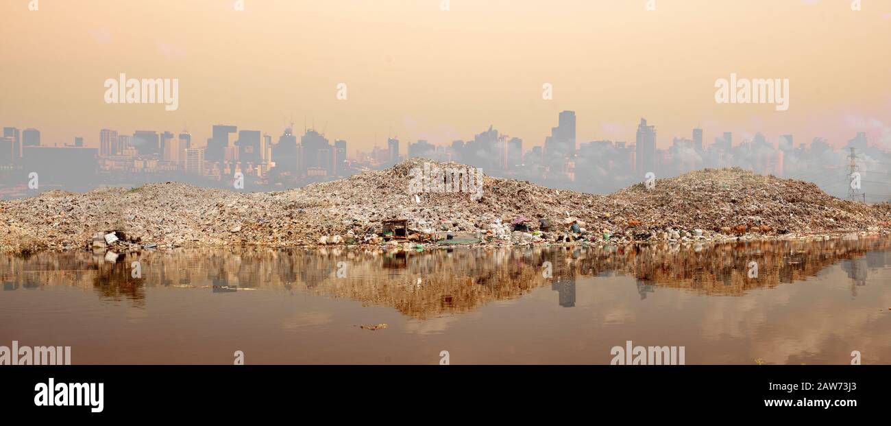 Toxic waste from human hands Industries that create pollution and cities that are affected by pollution. Concept of change climate or global warming. Stock Photo