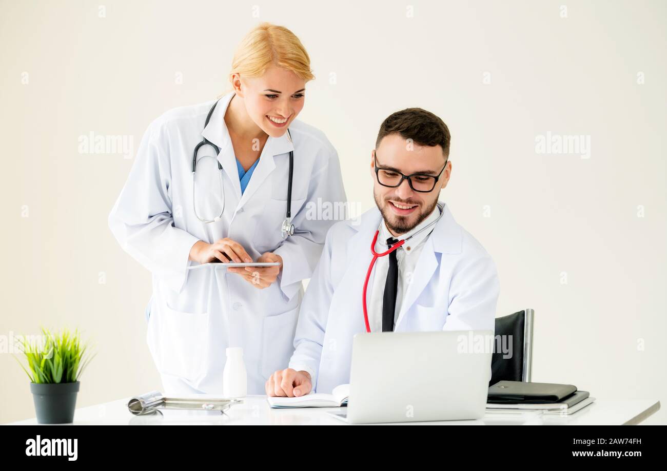 Doctors at hospital working with other doctor. Healthcare medical and doctor staff services