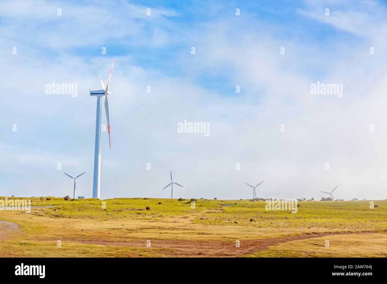 wind turbines in natural landscape - green meadow Stock Photo - Alamy