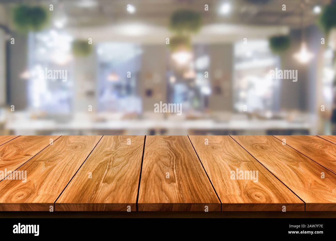 Wood table in blurry background of modern restaurant room or coffee shop  with empty copy space on the table for product display mockup. Interior  resta Stock Photo - Alamy