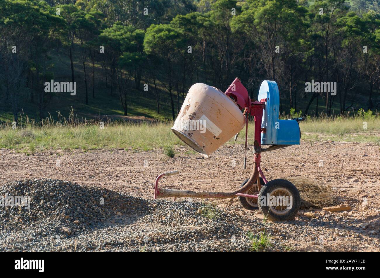 Concrete mixer on construction site background. Building, construction scene Stock Photo