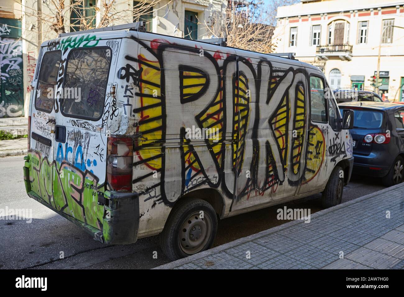 Grafiti on a car at Athens , vandalism Stock Photo