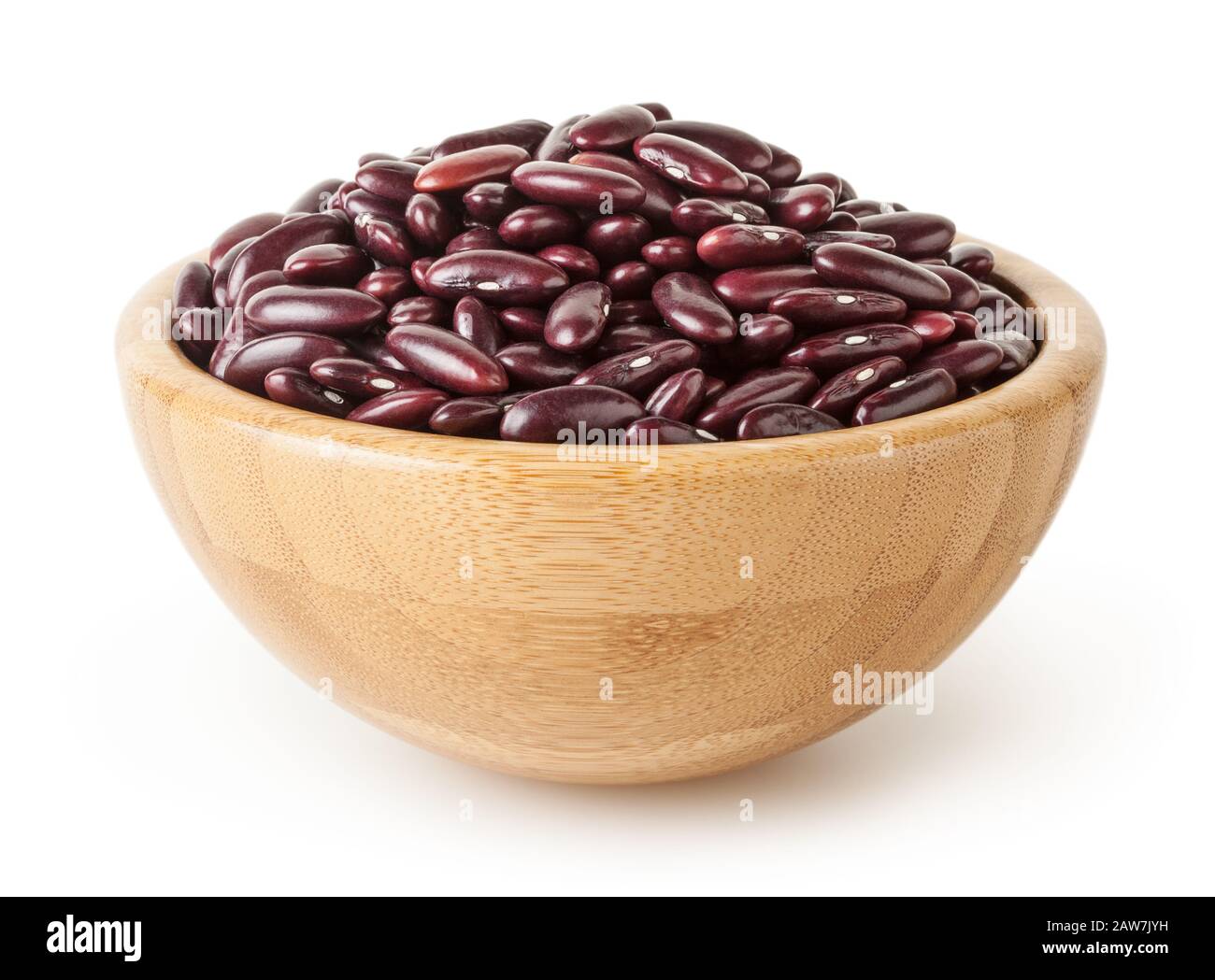 Uncooked red kidney beans in wooden bowl isolated on white background