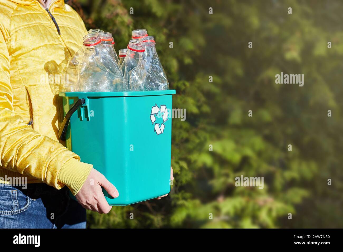 https://c8.alamy.com/comp/2AW7N50/save-the-world-plastic-free-girls-hands-hold-a-box-with-empty-plastic-bottles-sustainability-ecology-environmental-conservation-conceptual-image-f-2AW7N50.jpg