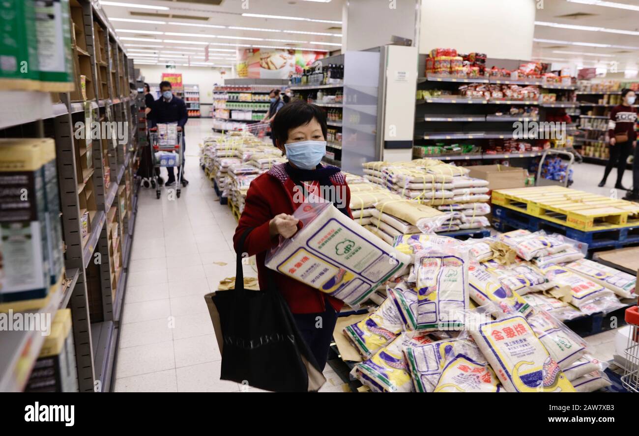 Hong Kong. 7th Feb, 2020. Woman grab pack of rice and walk away at the