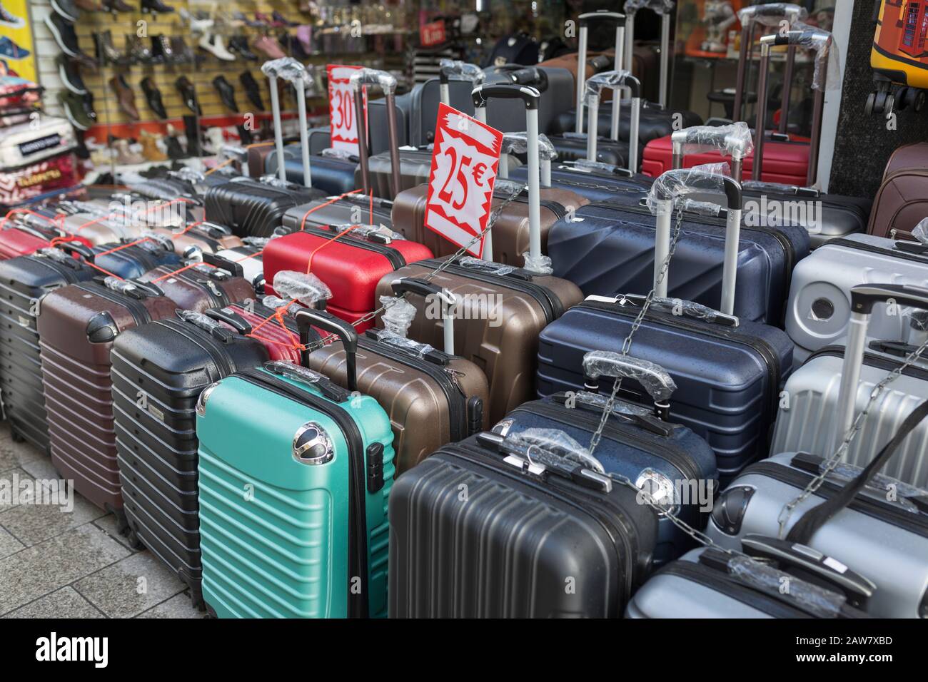 Travel bags and suitcases for sale at shopping street in Antwerp, Belgium Stock Photo