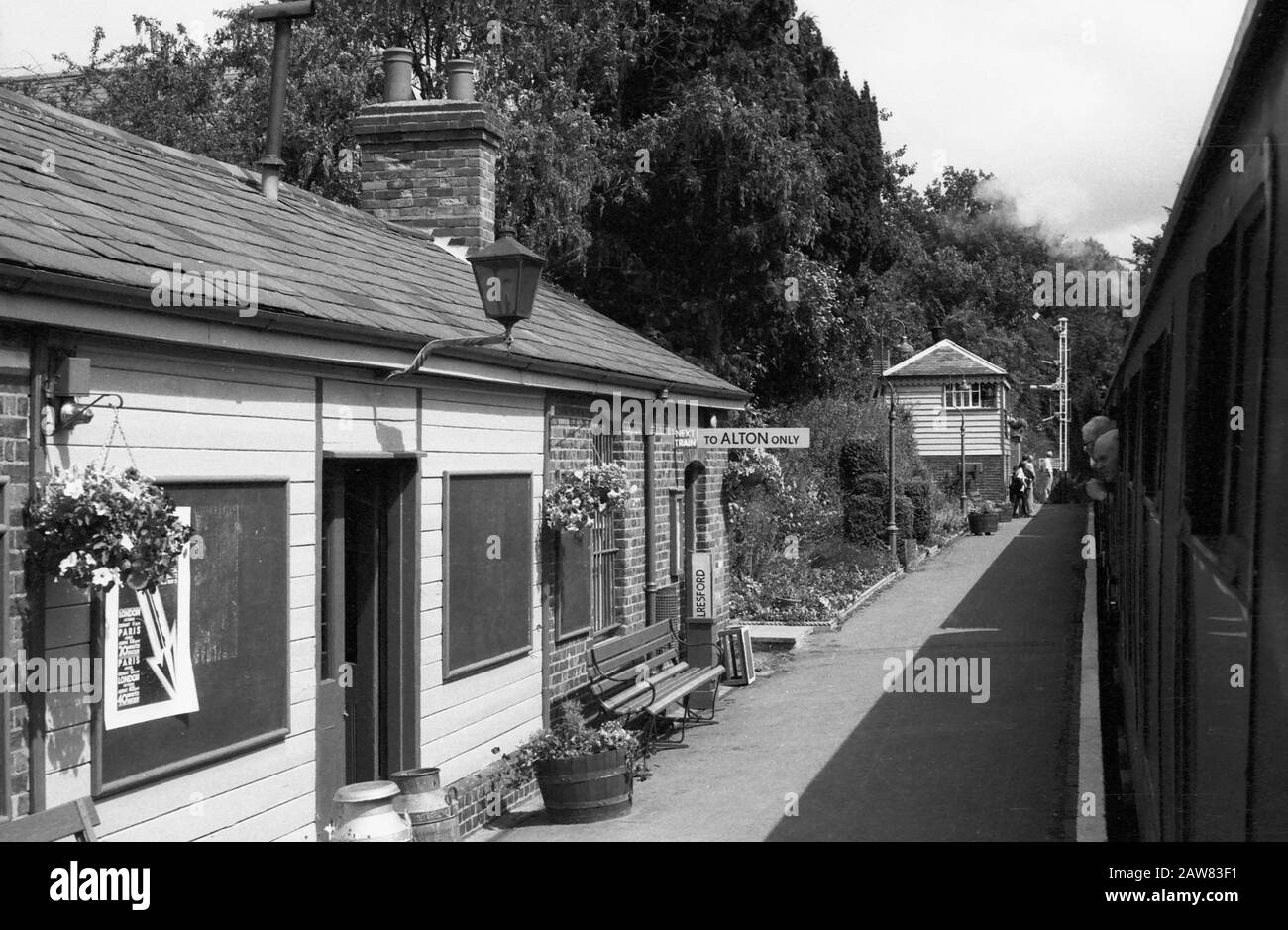 Medstead and Four Marks station platform, Mid-Hants Steam Railway (The Watercress Line), Hampshire, England, UK.  Black and white film photograph, circa 1996 Stock Photo