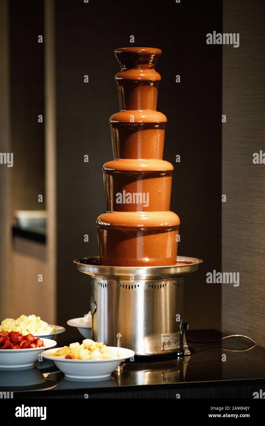 Chocolate fountain on a buffet table Stock Photo