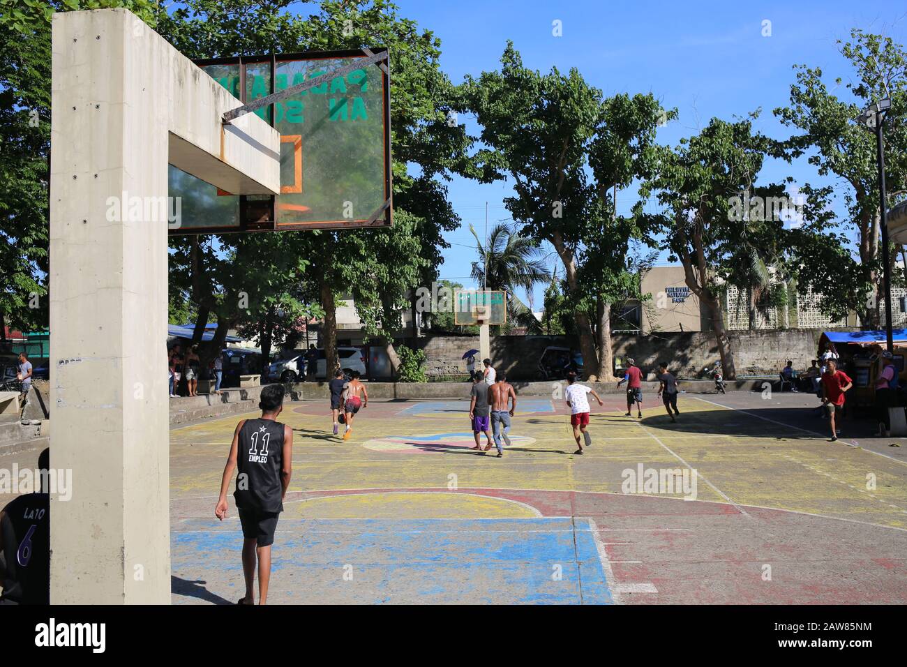 Boys playing basketball in The Philippines Stock Photo Alamy