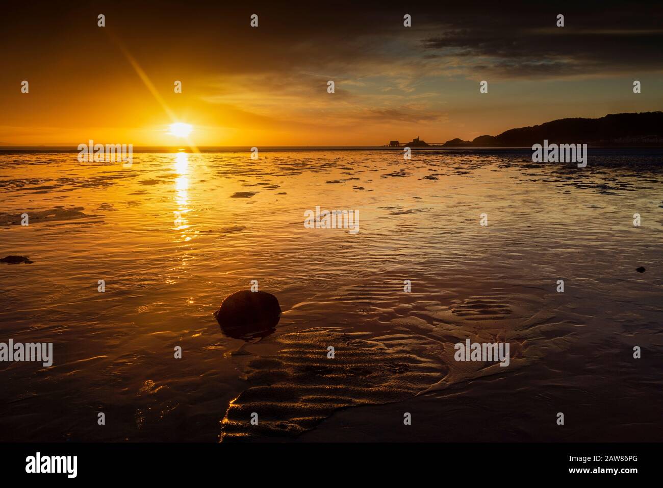 Sunrise at Swansea Bay Stock Photo