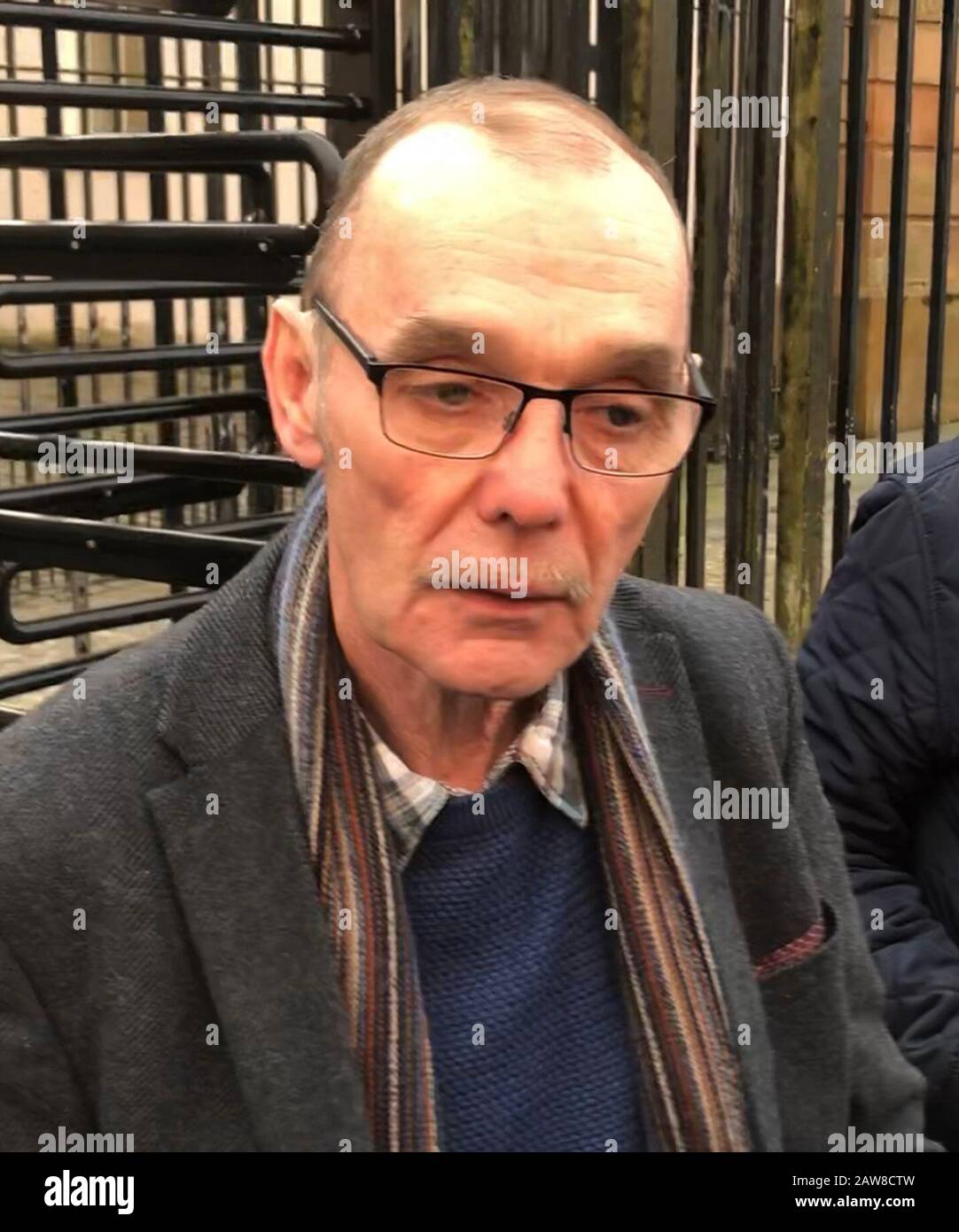 Liam Wray, whose brother James Wray was killed on Bloody Sunday, outside Bishop Street court house in Londonderry for the case involving 'Soldier F'. The ex-paratrooper is accused of murdering James Wray and William McKinney on January 30, 1972 when troops opened fire on civil rights demonstrators. Stock Photo