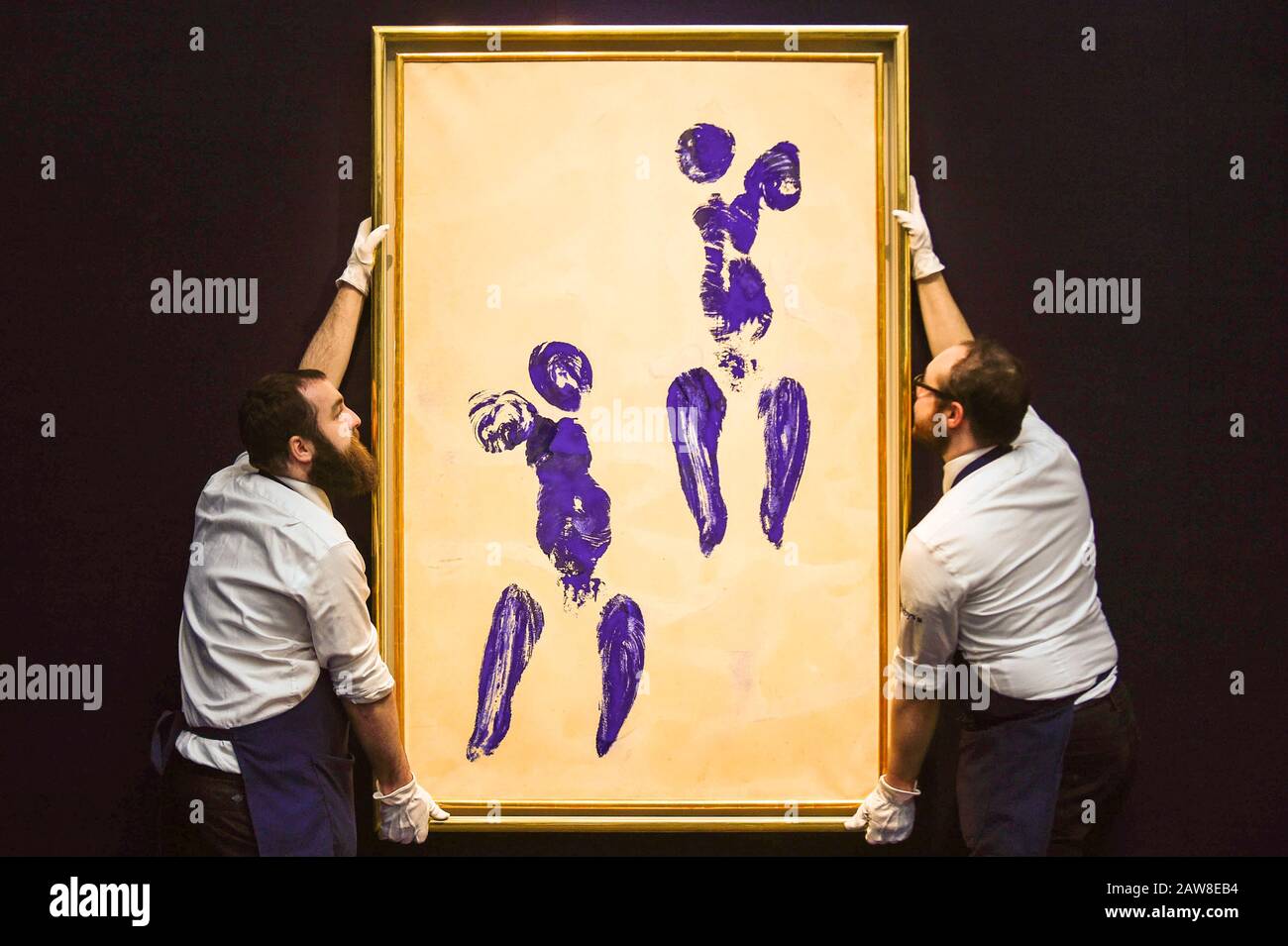 London, UK.  7 February 2020. Technicians present ''Untitled Anthropometry (Ant 132)'' by Yves Klein, (Est. £6,000,000 - 8,000,000). Preview of Sotheby's Contemporary Art Sale in their New Bond Street galleries.  Works by artists including Francis Bacon, Yves Klein, Jean-Michel Basquiat and David Hockney will be offered for auction on 11 February 2020. Credit: Stephen Chung / Alamy Live News Stock Photo