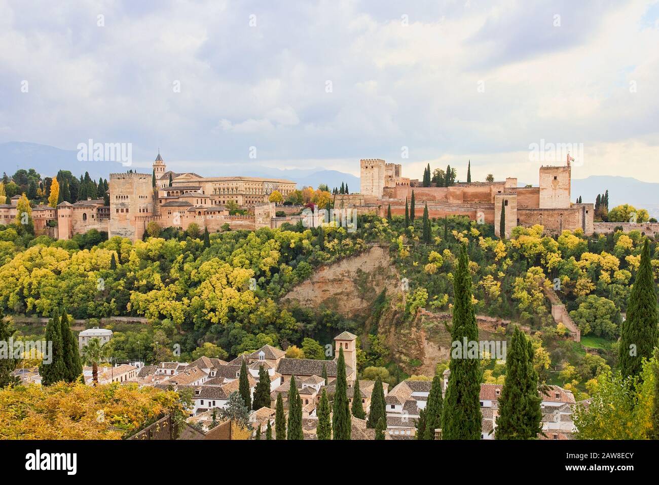 Alhambra panoramic scenic view with cloudy sky in Granada from the Albaicin, Andalucia, Spain. Stock Photo