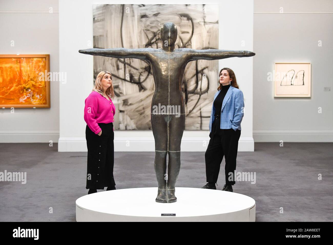 London, UK.  7 February 2020. Staff members view ''Standing Ground '' by Antony Gormley, (Est. £500,000 - 700,000). Preview of Sotheby's Contemporary Art Sale in their New Bond Street galleries.  Works by artists including Francis Bacon, Yves Klein, Jean-Michel Basquiat and David Hockney will be offered for auction on 11 February 2020. Credit: Stephen Chung / Alamy Live News Stock Photo