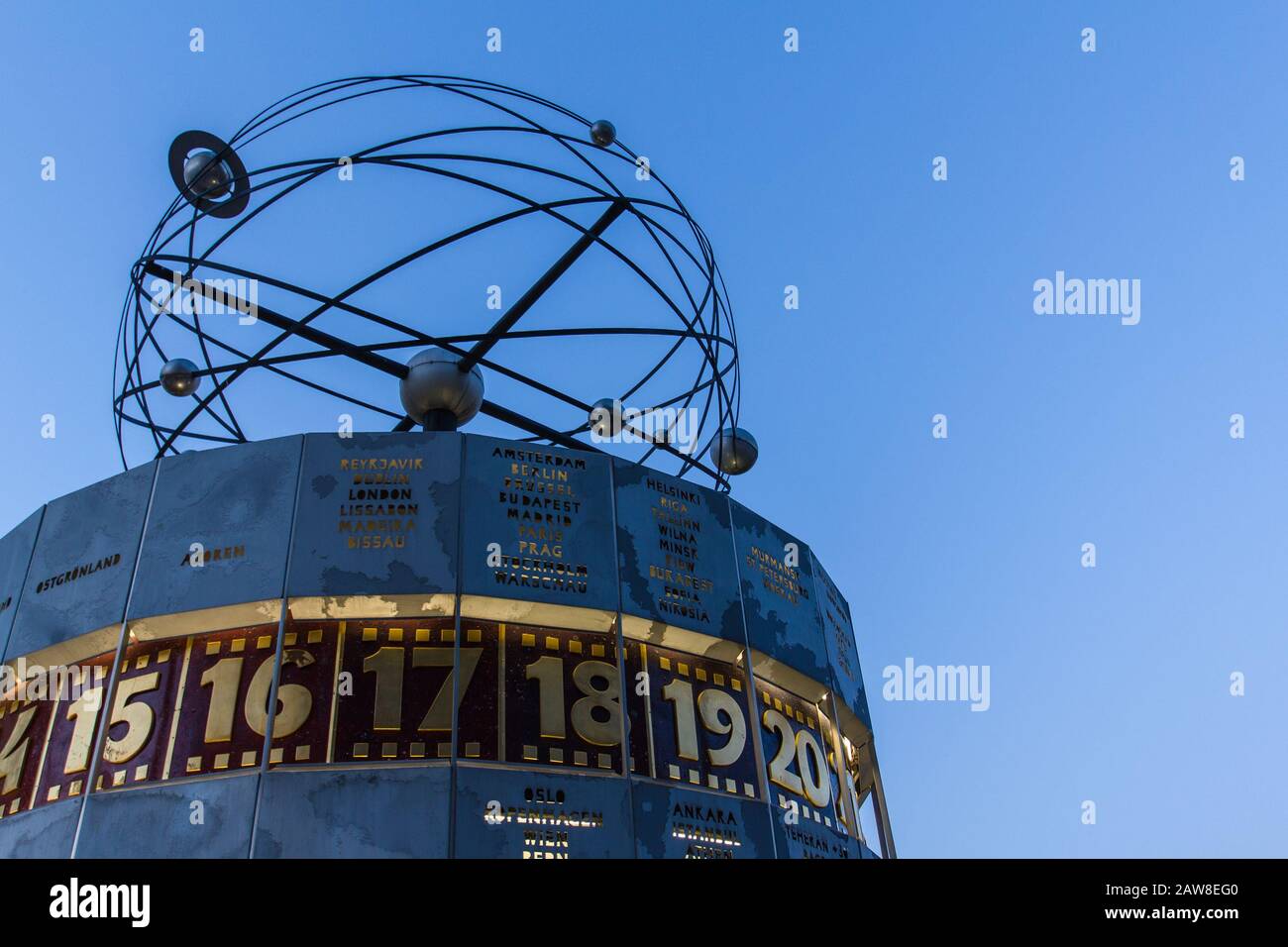 Berlin World Clock at Night Stock Photo Alamy