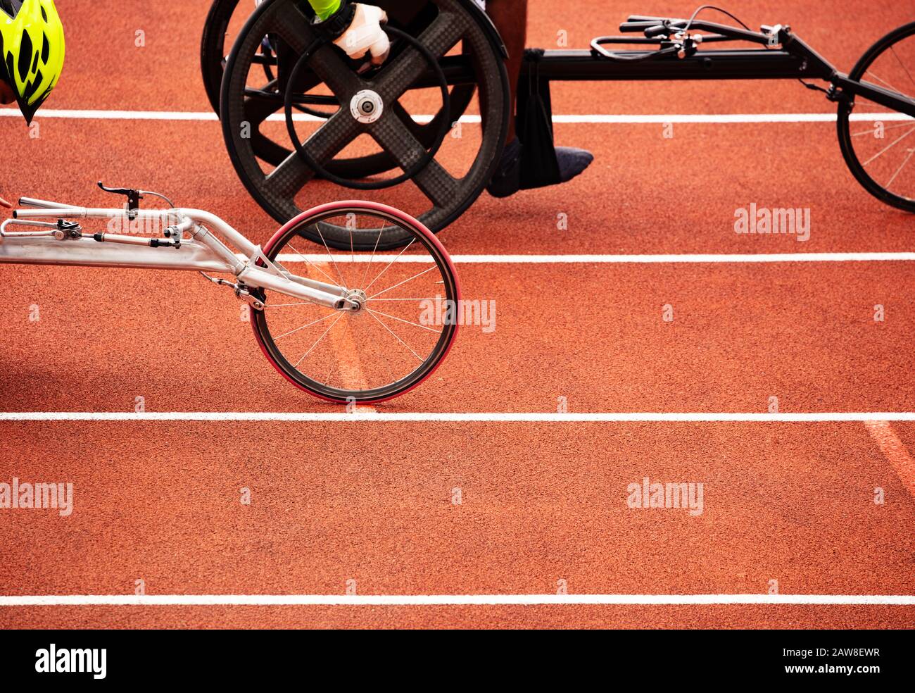 Close-up of the wheels of bike wheelchair for disabled sportsman people during sport competition Stock Photo