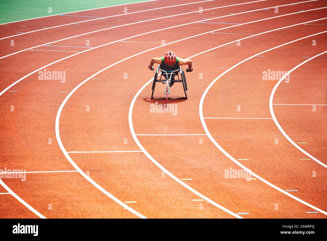 Disabled sportsman on sport competition wheelchair on the chair Stock Photo