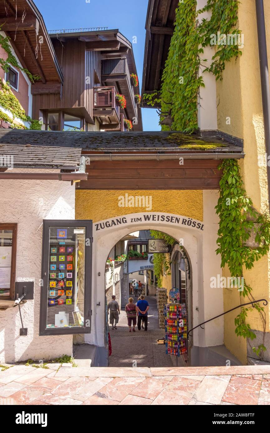 St. Wolfgang, Austria - June 23, 2014: Access tot the Hotel Weisses Roessl at the famous lake Wolfgangsee. Popular travel destination within Austria. Stock Photo