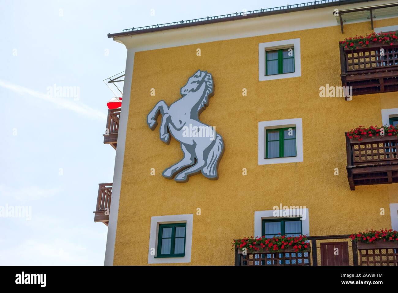 St. Wolfgang, Austria - June 23, 2014: Roesslterrace at the Wolfgangsee in St. Wolfgang. Front with logo of the famous hotel Weisses Roessl, a popular Stock Photo