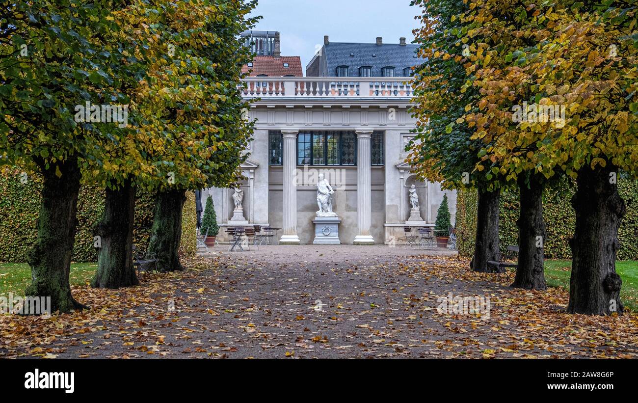 The Hercules Pavilion is a former royal pavilion built in Neoclassical style now used as a cafe in the Rosenborg Castle Gardens, Copenhagen Stock Photo
