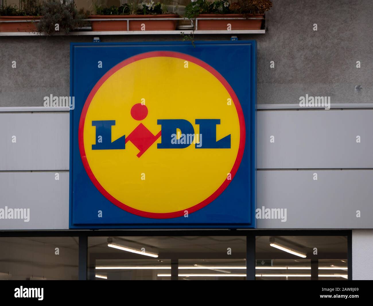 BERLIN, GERMANY - FEBRUARY 4, 2020: Lidl Logo At A Supermarket in Berlin, Germany Stock Photo