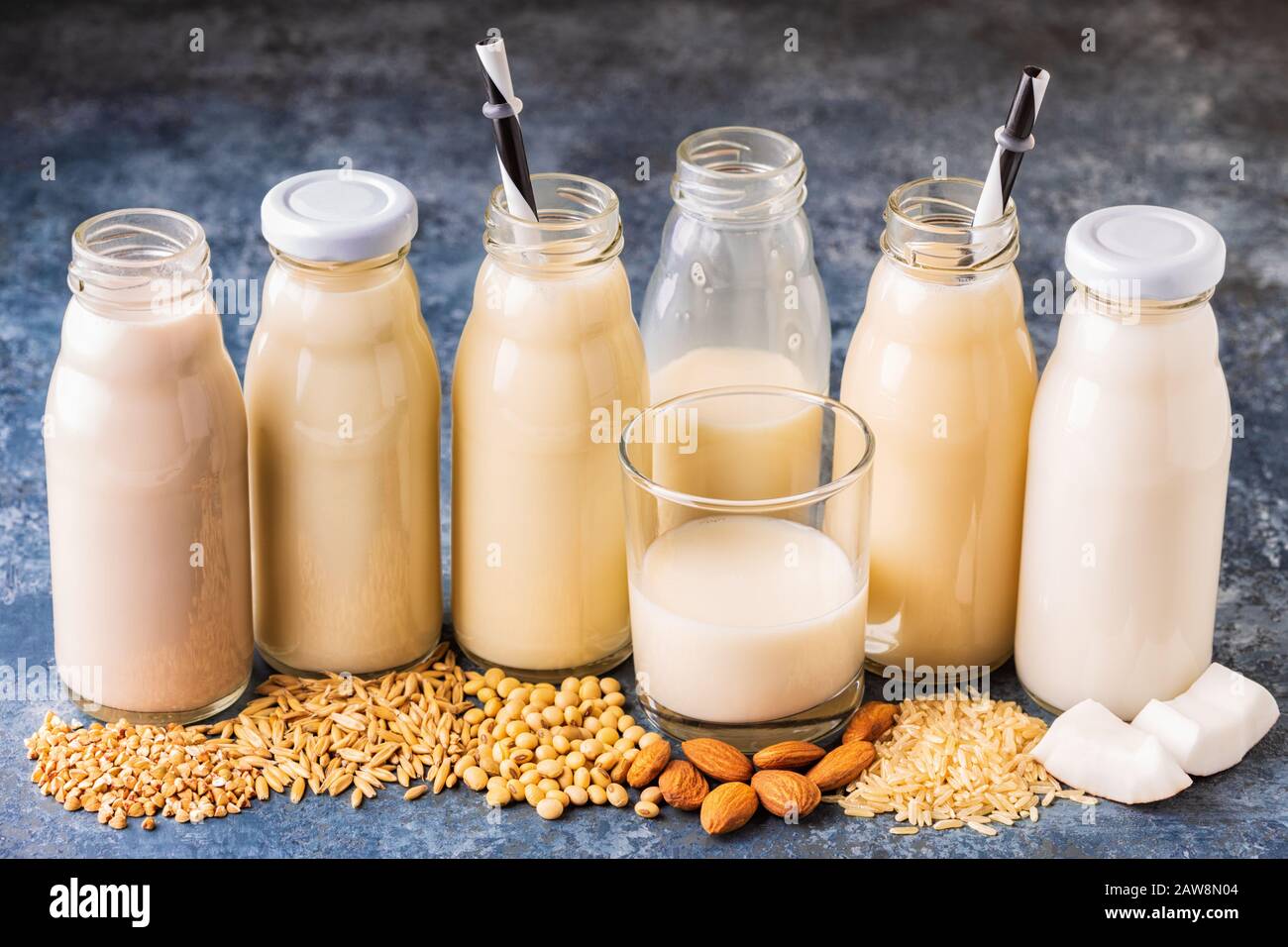 A bottles of alternative  milk and ingredients for cooking. Stock Photo