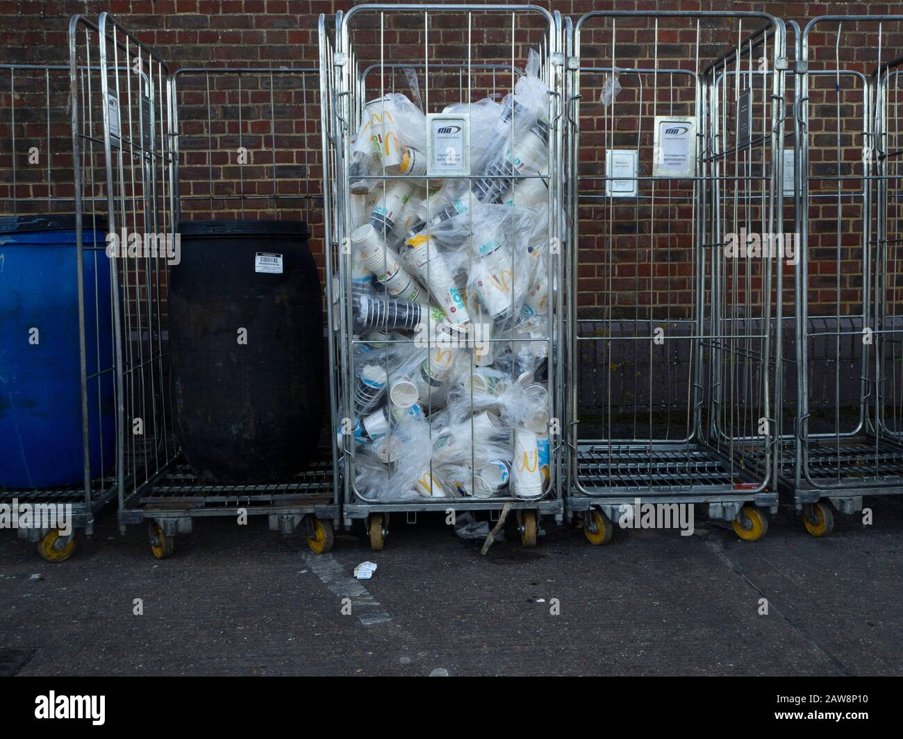 McDonalds disposable paper cups in a frame roll container ready for recycling Stock Photo Alamy
