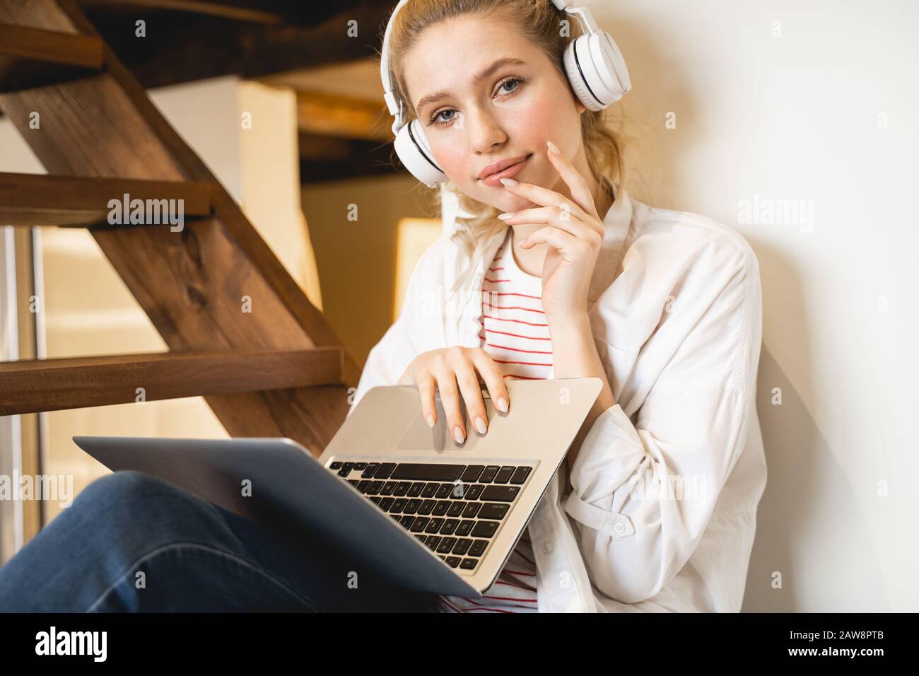 Portrait of pleased girl that posing on camera Stock Photo - Alamy
