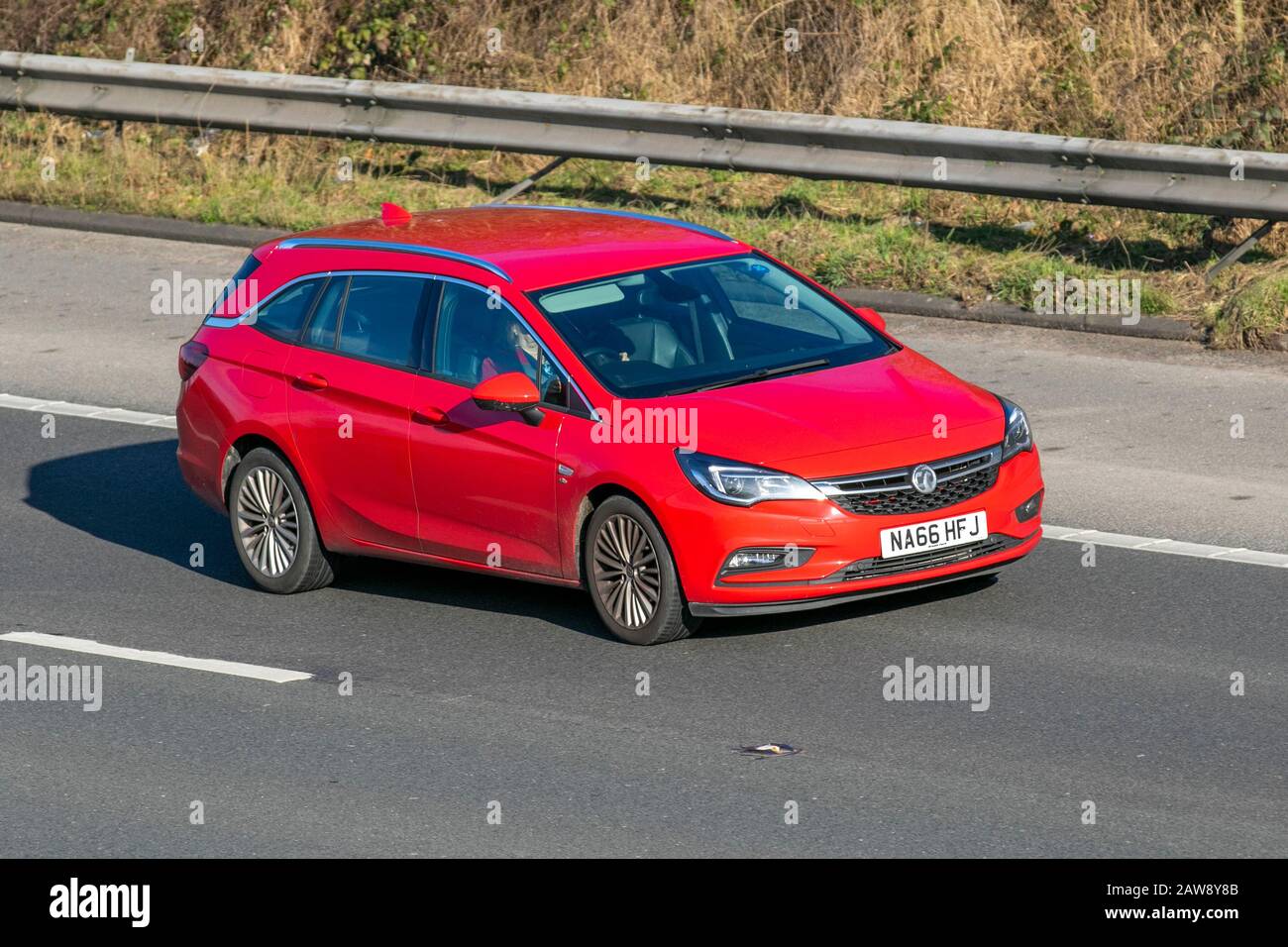 16 Red Vauxhall Astra 1 4i Turbo Elite Nav Hatchback 5dr Petrol Uk Vehicular Traffic Transport Modern Saloon Cars On The M61 Motorway Manchester Uk Stock Photo Alamy