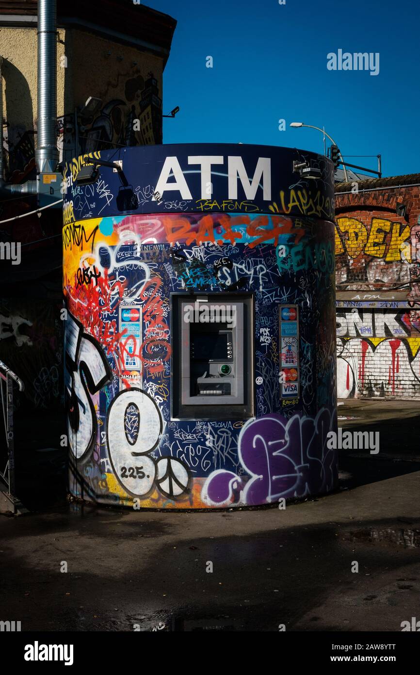 Berlin, Germany - February, 2020: Street ATM machine for withdrawal of cash money  in Berlin Stock Photo