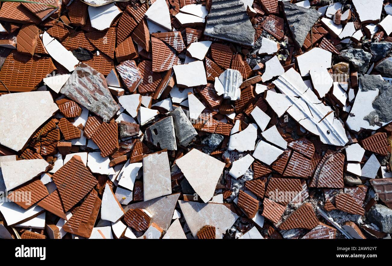 broken ceramic tiles and concreate background Stock Photo Alamy