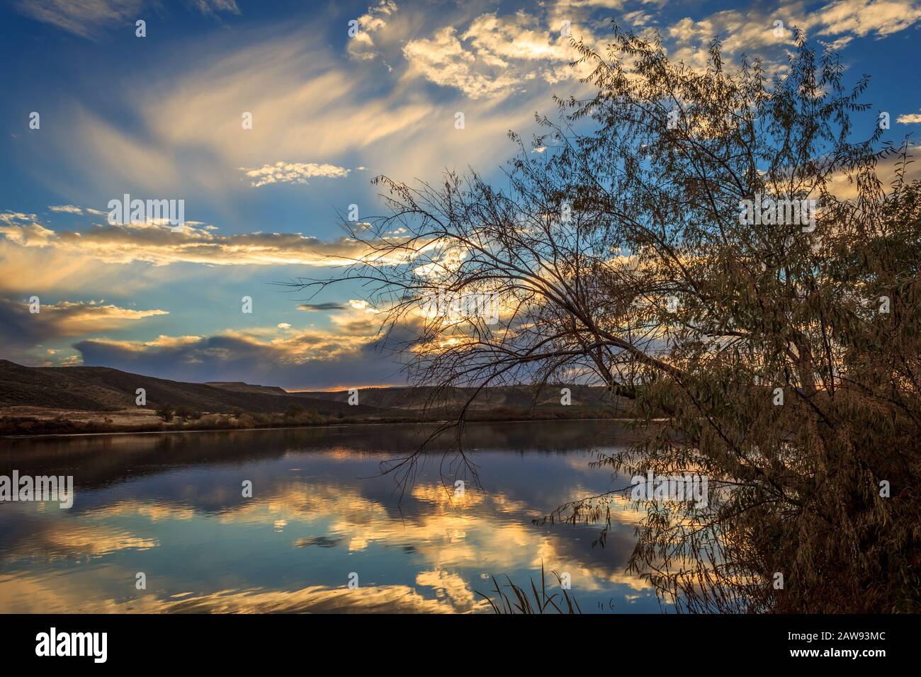 The sun sets on the Snake River at Three Island State Park, Glenn's Ferry, Idaho, USA Stock Photo