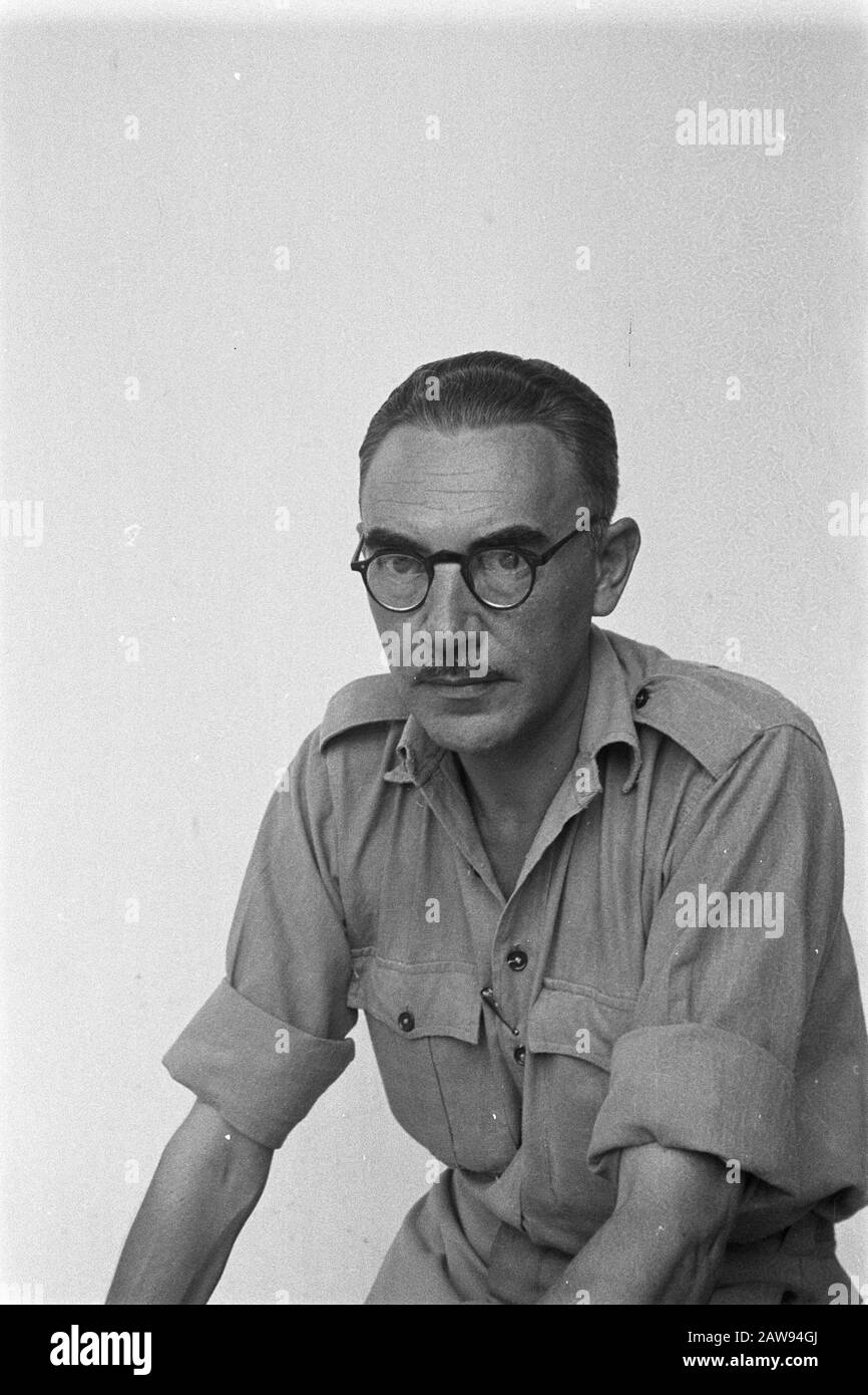 portrait images (miscellaneous) [passport photographs]  Dutch uniformed man with mustache and glasses Annotation: Will later date for the s01.01.1947 Location: Indonesia Dutch East Indies Stock Photo
