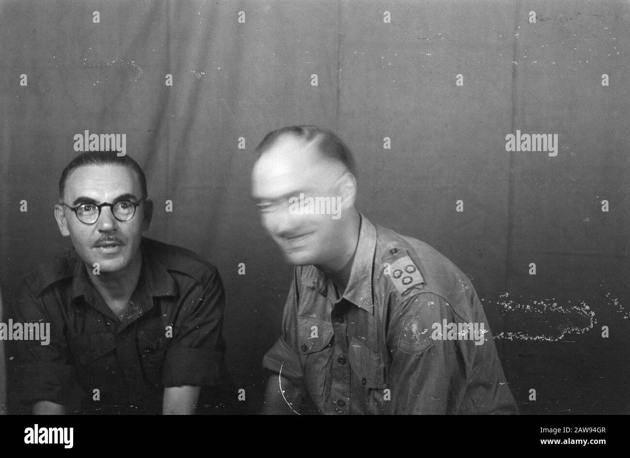 portrait images (miscellaneous) [passport photographs]  Man in uniform with dark glasses and mustache (left) and Captain KL Date: 1947 / 01/01 Location: Indonesia Dutch East Indies Stock Photo