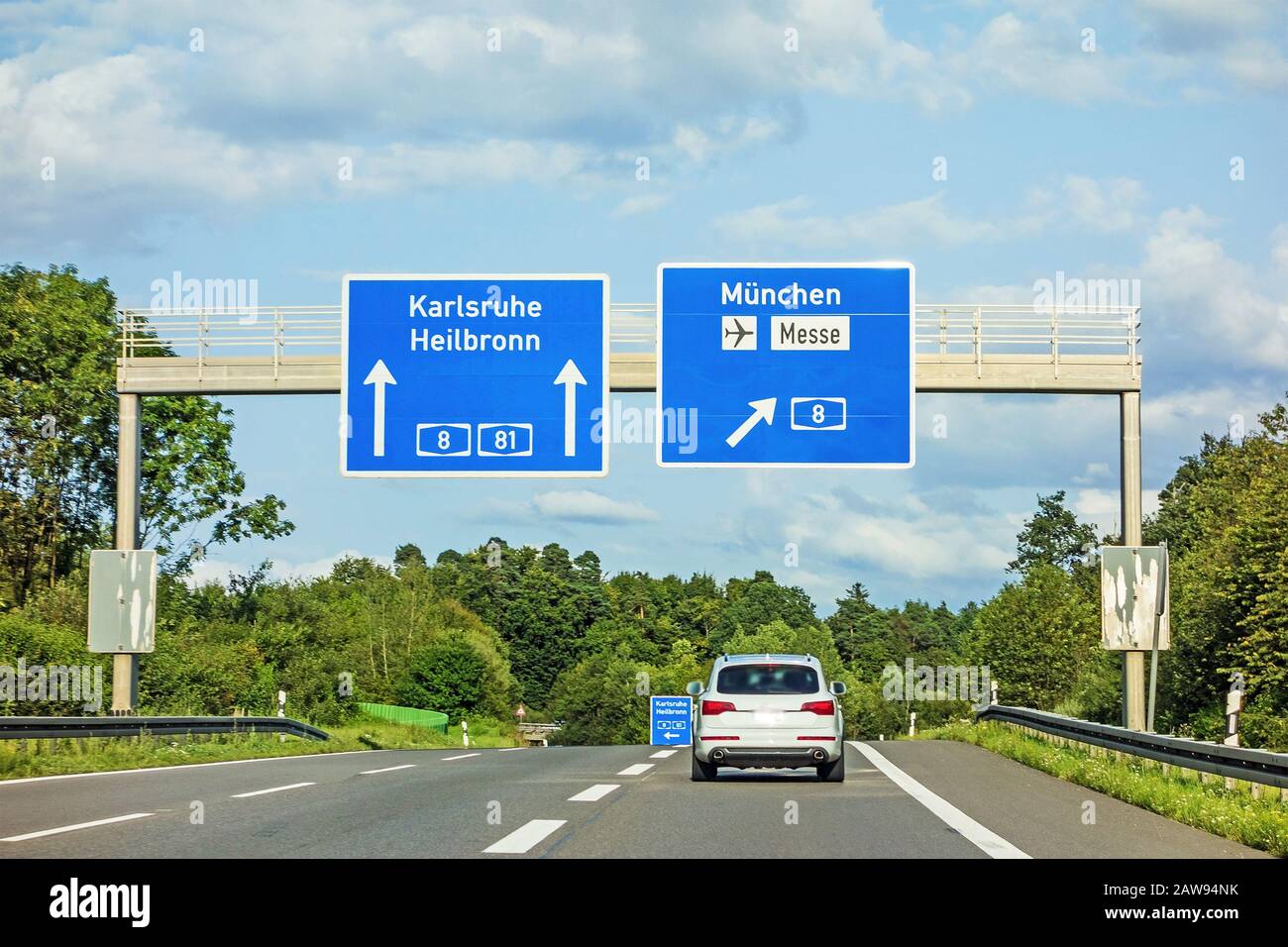 motorway road sign on (Autobahn A 81 / A 8) directions Karlsruhe / Heilbronn - exit A 8 to Munich / Airport / Messe Stock Photo