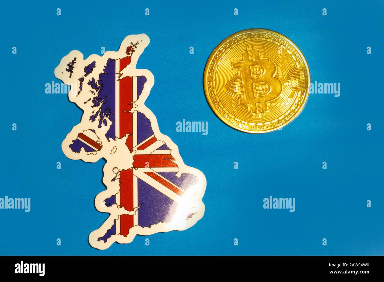 UK Flag with Bitcoin flat lay for illustration. Cryptocurrency btc law concept Stock Photo